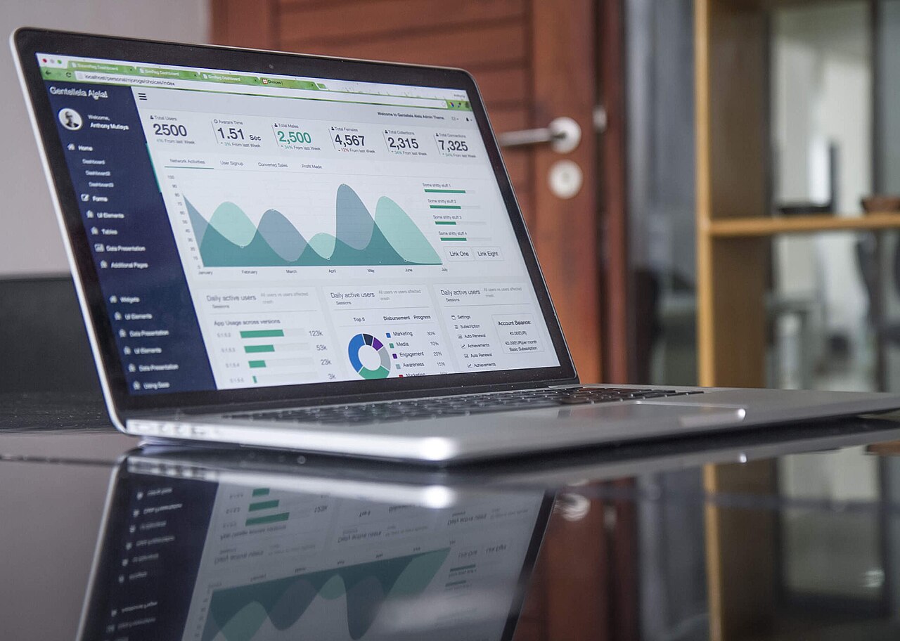 A laptop screen showing statistics and data