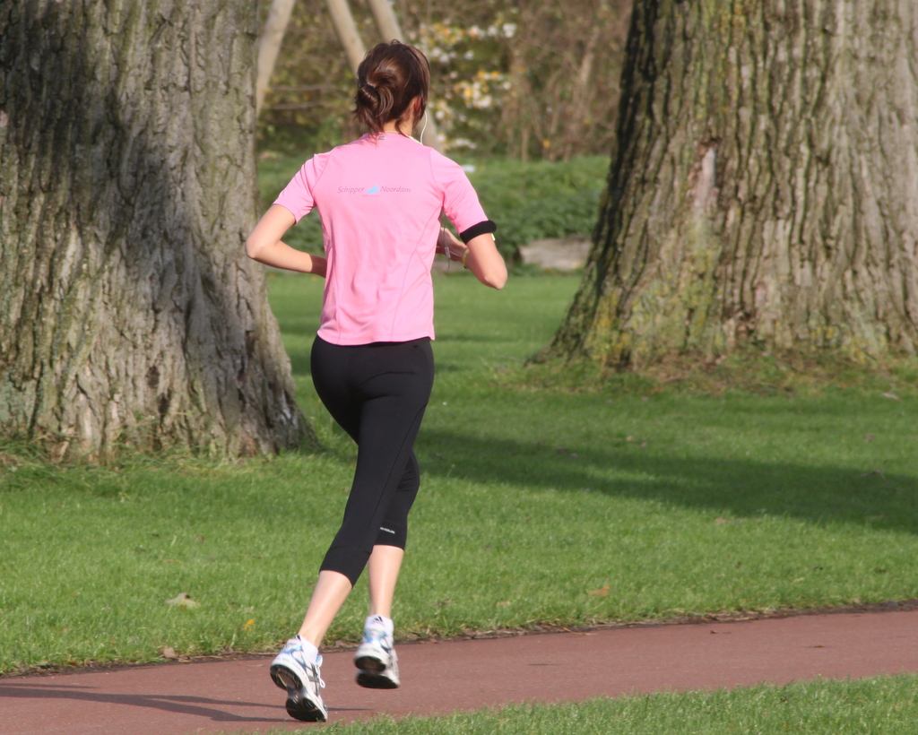 A woman jogging outdoors